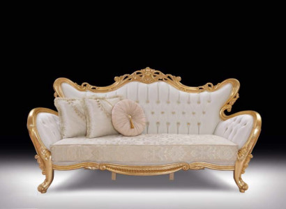 A luxurious and relaxing sofa in classic style with golden patterns